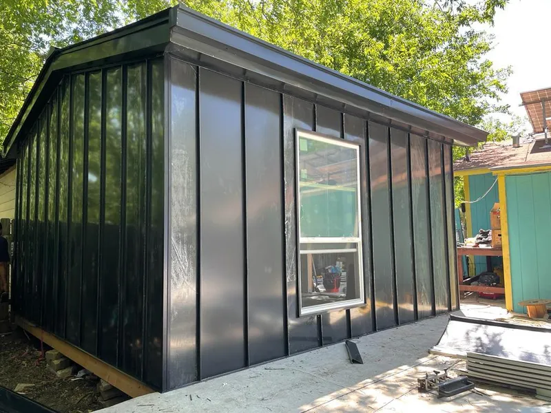 Black standing seam metal wall panels for Metal Roof Installation in Great Falls